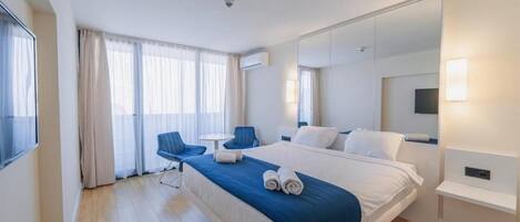 1 habitación, tabla de planchar con plancha, wifi y ropa de cama