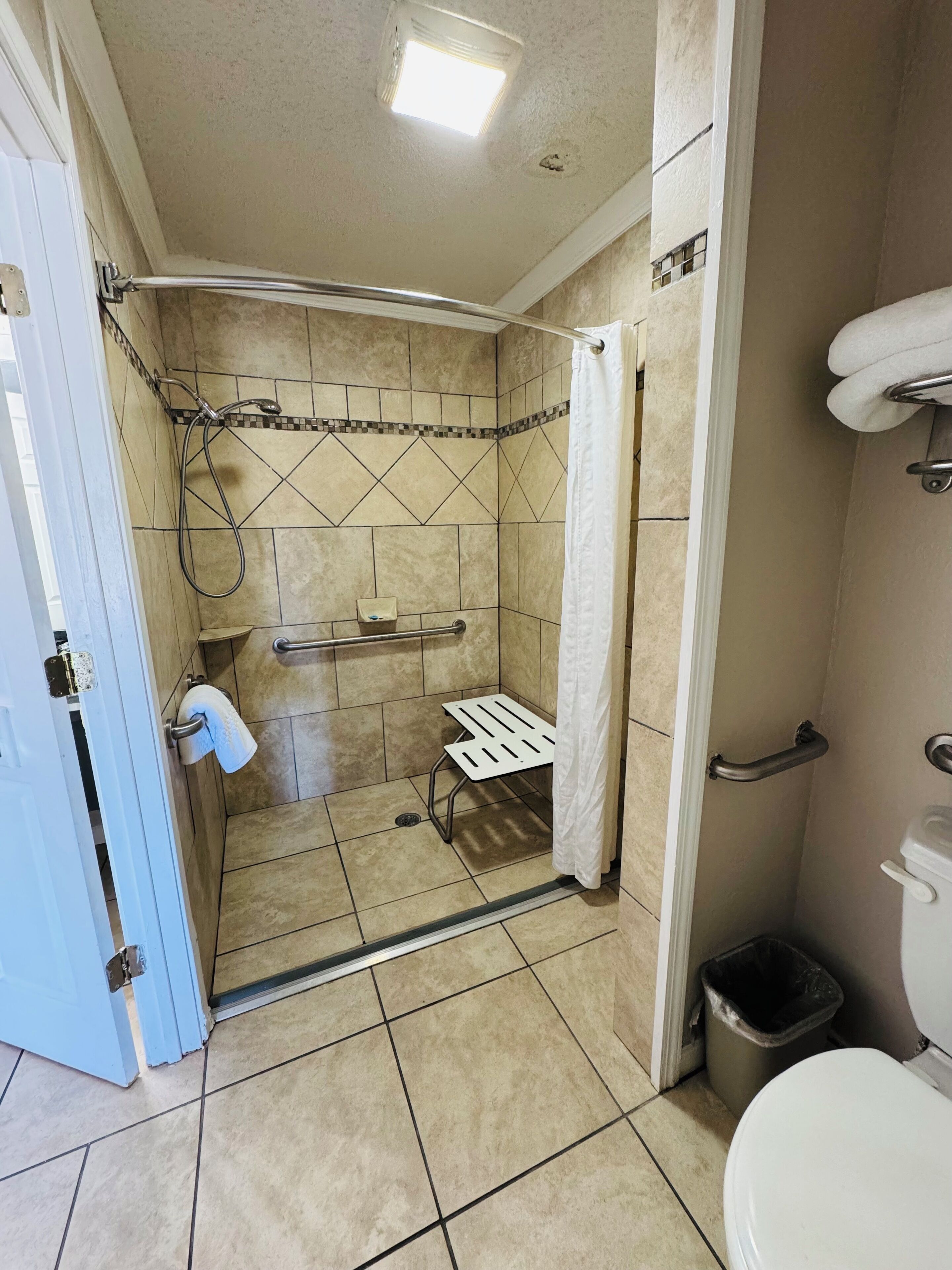 Hair dryer, towels, soap, shampoo