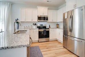 Fridge, microwave, stovetop, dishwasher - Modern Family Home in Hampstead w/ Patio & Grill! (Hampstead)