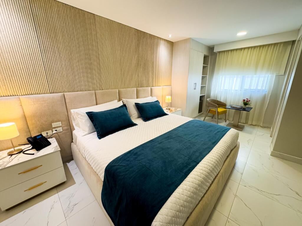 Habitació Deluxe | Minibar, caixa forta a l'habitació i planxa i posts de planxar 