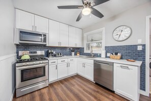 Fridge, microwave, oven, stovetop - Modern & Inviting Remodeled 3BR in Independence, KS! (Independence)