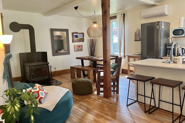 Open concept living, dining and kitchen areas