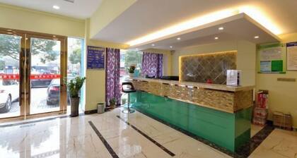 Huaji Business Hotel