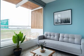 Apartamento, 3 quartos (B) | Sala de estar | Pisos aquecidos