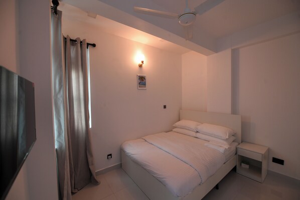 1 habitación, tabla de planchar con plancha, wifi y ropa de cama 