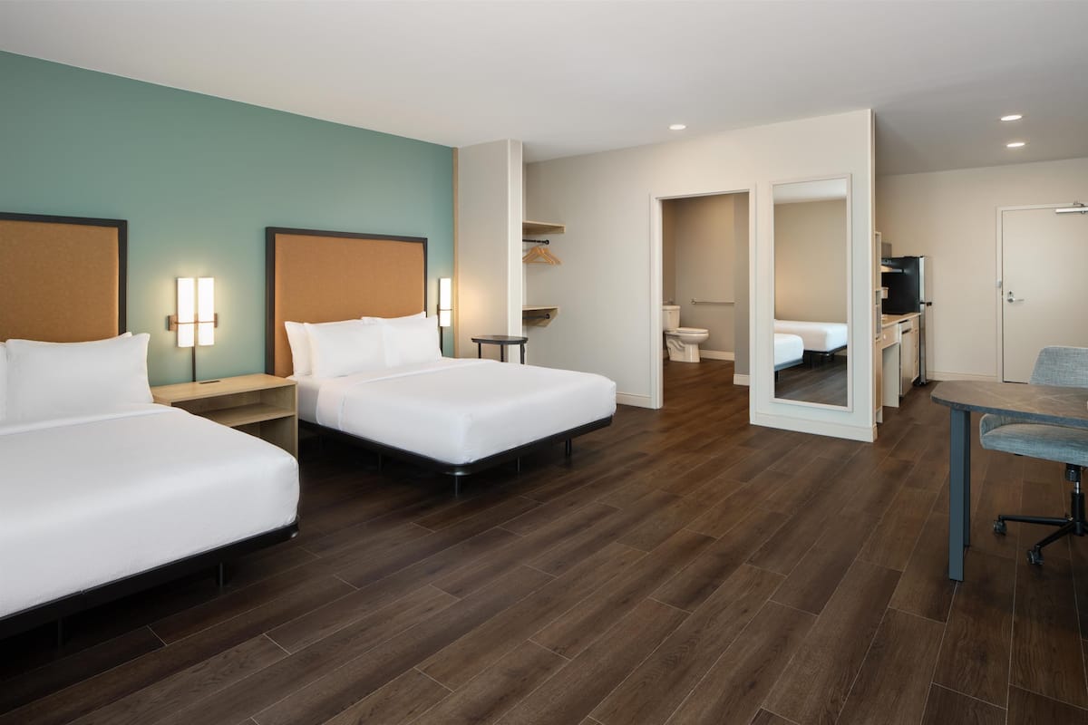 Studio Suite, 2 Queen Beds, Accessible, Bathtub (Mobility) | Free cribs/infant beds, free WiFi, bed sheets