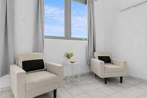 Departamento familiar, vista a la ciudad | Tabla de planchar con plancha y wifi gratis 