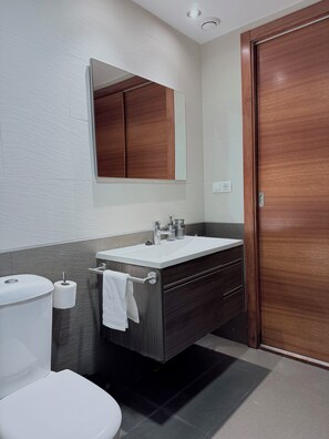 Hair dryer, bidet, towels, soap