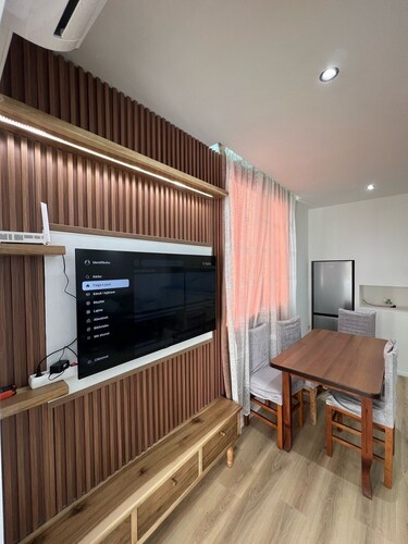 “Modern flat overlooking city centre”