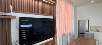 “Modern flat overlooking city centre”
