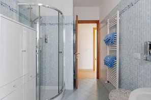 Hair dryer, towels, soap, shampoo