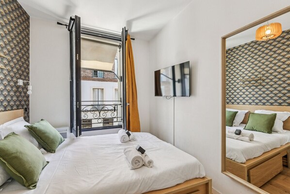 1 bedroom, desk, iron/ironing board, travel cot