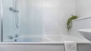 Hair dryer, towels, soap, shampoo
