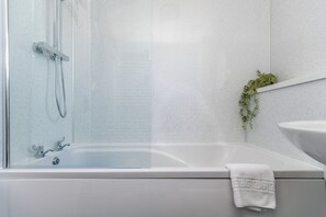 Hair dryer, towels, soap, shampoo