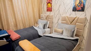 2 bedrooms, iron/ironing board, travel crib, WiFi