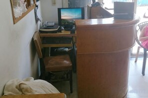 A room with a desk, computer, chair, and a bed. - Jinying Hostel (Shanghai)