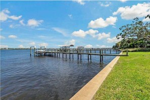 Relax on the dock with a serene lakeside view.