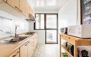 Fridge, microwave, stovetop, coffee/tea maker