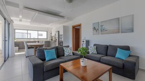 Living area - Charming 2-bedroom condo in tranquil Las Terrenas with AC (Las Terrenas)