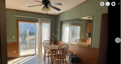 Quaint 3-bedroom cottage on working farm in small rural America. Pet friendly