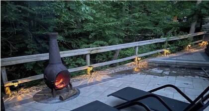 European inspired 2-bedroom cabin with a brooke in back patio, in Monroe, NY.