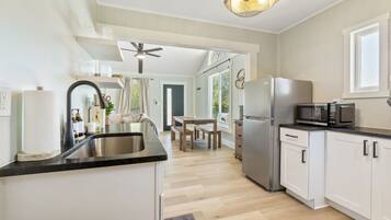 Fridge, microwave, coffee/tea maker, toaster