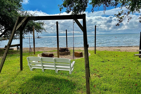Great to sit around the fire pit and relax! Outdoor lighting, picnic table.