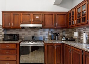 Standard Apartment, 3 Bedrooms, City View | Private kitchen | Fridge, microwave, oven, stovetop