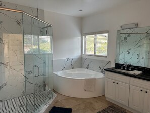 Shower, jetted tub, hair dryer, towels
