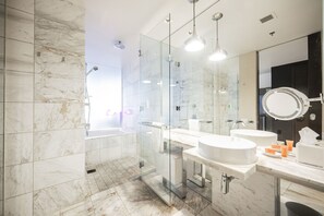 Shower, jetted tub, hair dryer, towels