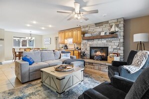Smart TV, fireplace, books