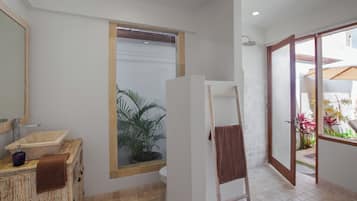 Shower, towels, soap, toilet paper