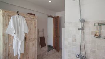 Shower, towels, soap, toilet paper