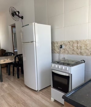 Fridge, microwave, stovetop, cookware/dishes/utensils
