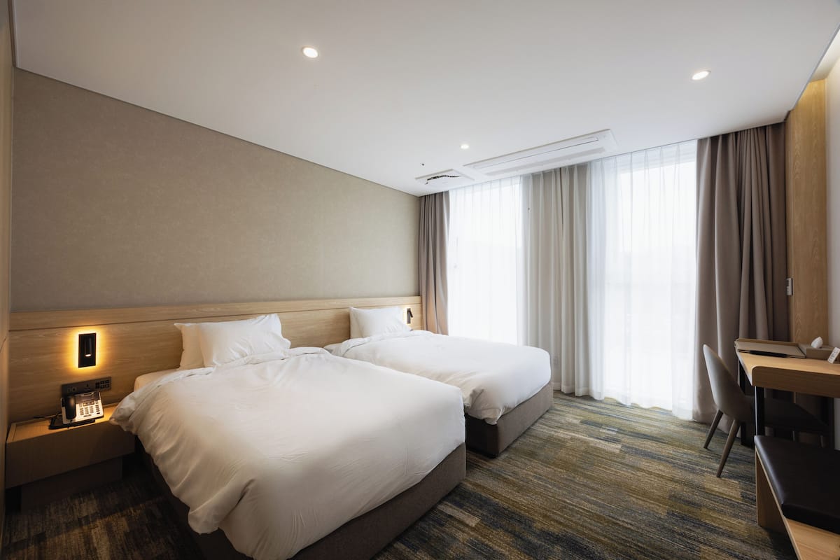 Chambre Standard avec lits jumeaux, vue montagne | 1 chambre, literie de qualité supérieure, couette en duvet d'oie