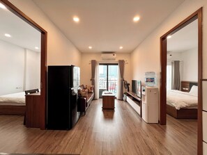 Departamento familiar | Área de sala de estar | Smart TV de 25 pulgadas con canales digitales