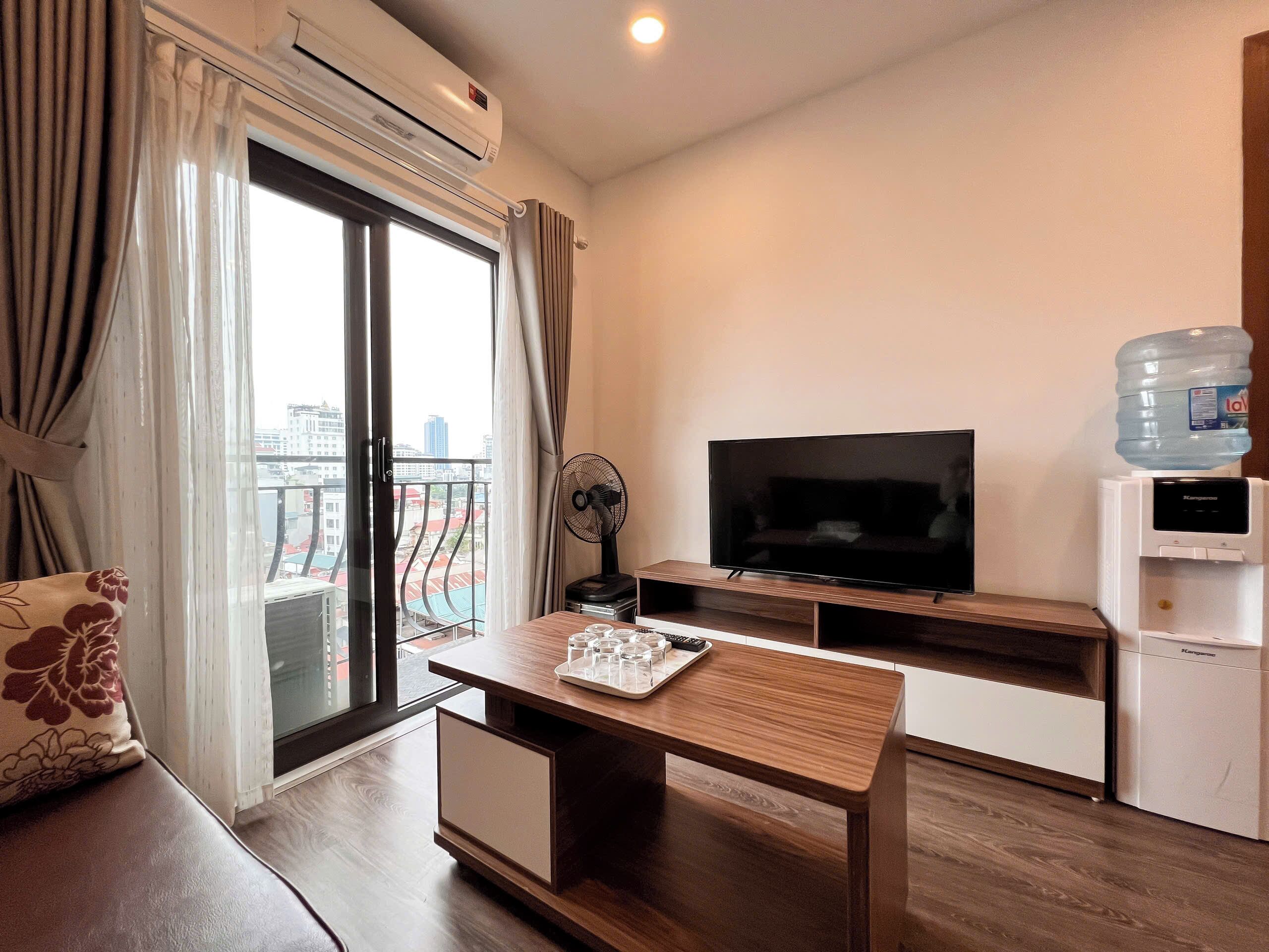 Family Apartment | Living area | 25-inch Smart TV with digital channels