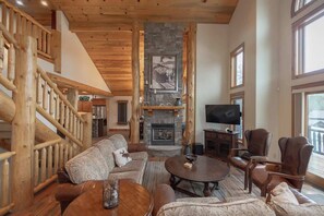 Una televisión, una chimenea, un reproductor estéreo, una oficina