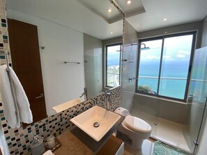 Shower, hair dryer, towels, soap
