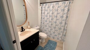 Bidet, towels, soap, toilet paper