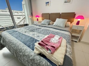 Laptop workspace, free WiFi, bed sheets