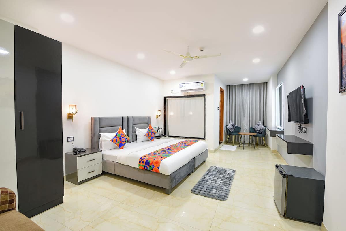 Premium kamer | Lakens van Egyptisch katoen, luxe beddengoed, een minibar