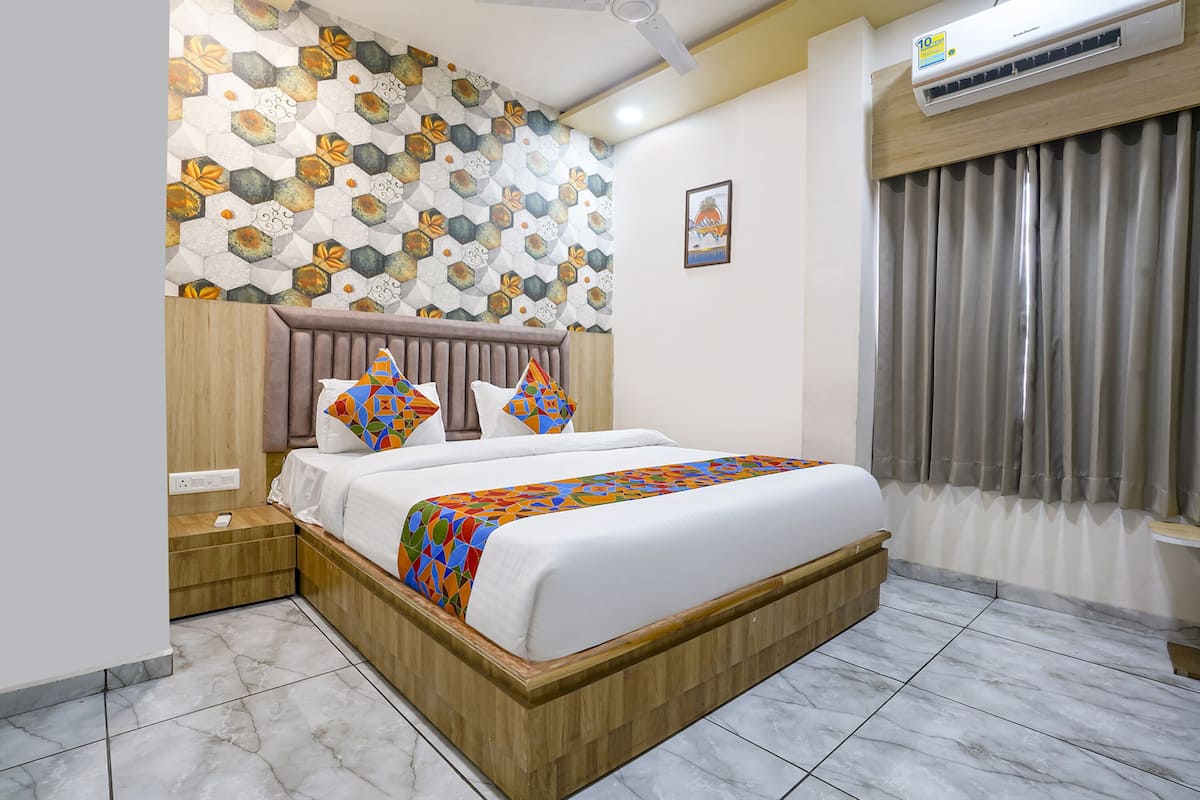 Deluxe kamer | Lakens van Egyptisch katoen, luxe beddengoed, een kluis op de kamer