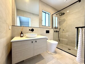 Shower, hair dryer, towels, soap