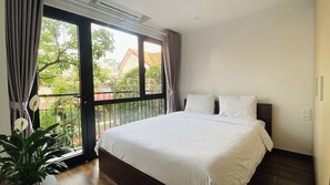 Apartamento Deluxe, vistas a la ciudad | Escritorio y espacio para trabajar con un portátil