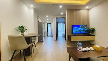 Superior Apartment, City View | Living area | 45-inch LCD TV with cable channels