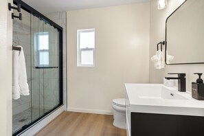 Shower, hair dryer, towels, soap