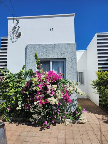 Modern, cozy 3 bedroom house in a 24/7 gated secured community.