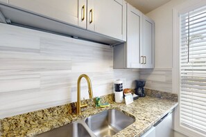 Fridge, microwave, dishwasher, coffee/tea maker