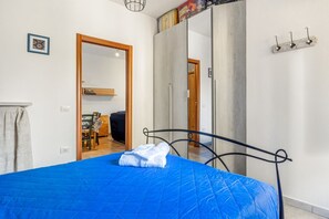 2 bedrooms, iron/ironing board, WiFi - GuestHost - Cozy 70 sqm apartment with private parking space; accommodates up to 4 people plus camping cot on request.The courtyard is covered and privateWe are located in a renowned tourist resort on the Gulf of Cagliari.The accommodation consists of tw (Cagliari)